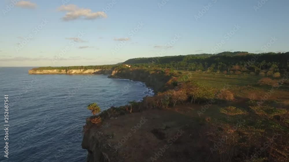 Flight over the rocky shore at sunset. La Preciosa, Dominican Republic. Flight over the rocky shore at sunset. La Preciosa, Dominican Republic.