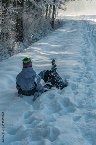 kids exploring the forest in winter