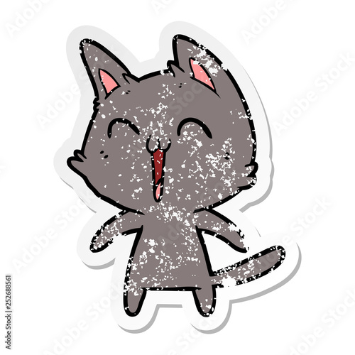 distressed sticker of a happy cartoon cat meowing