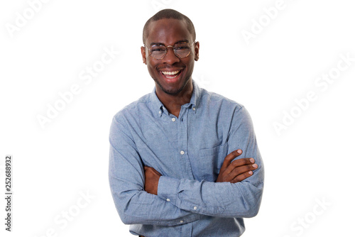young african american businessman with glasses smiling with arms crossed against isolated white background