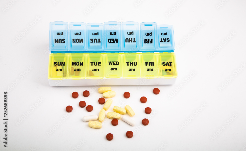 A pill dosage container with markings for morning and night or to use for two weeks A pill dosage container with markings for morning and night or to use for two weeks