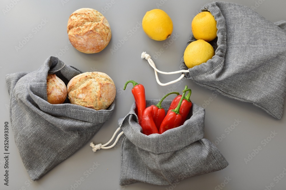 Reusable hand made linen produce bags, zero waste lifestyle, flat lay,  modern gray background. Stock Photo | Adobe Stock