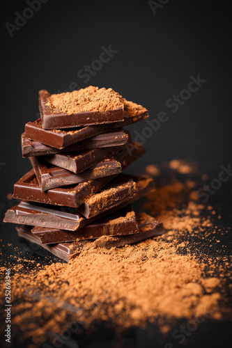 dark chocolate stack and cocoa powder