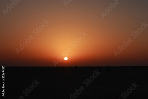 people watching desert sunrise