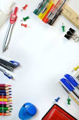Vertical layout with stationery for school or office.