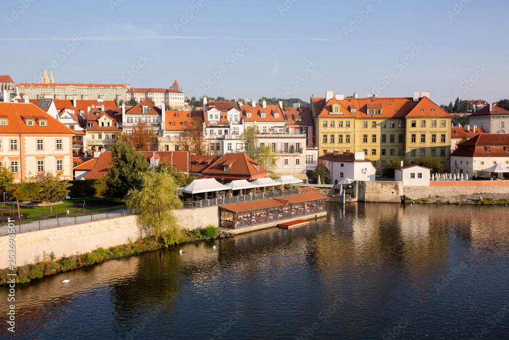Beautiful cityscape with river Vltava and old city Prague