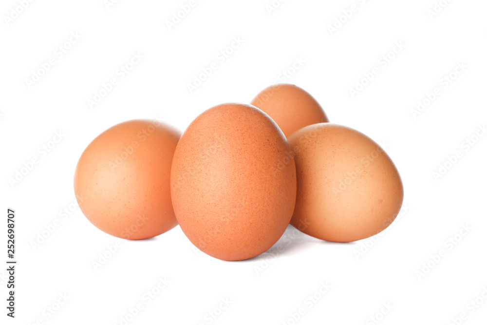 Few raw chicken eggs on white background Few raw chicken eggs on white background