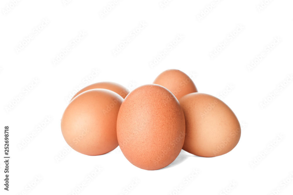 Few raw chicken eggs on white background Few raw chicken eggs on white background