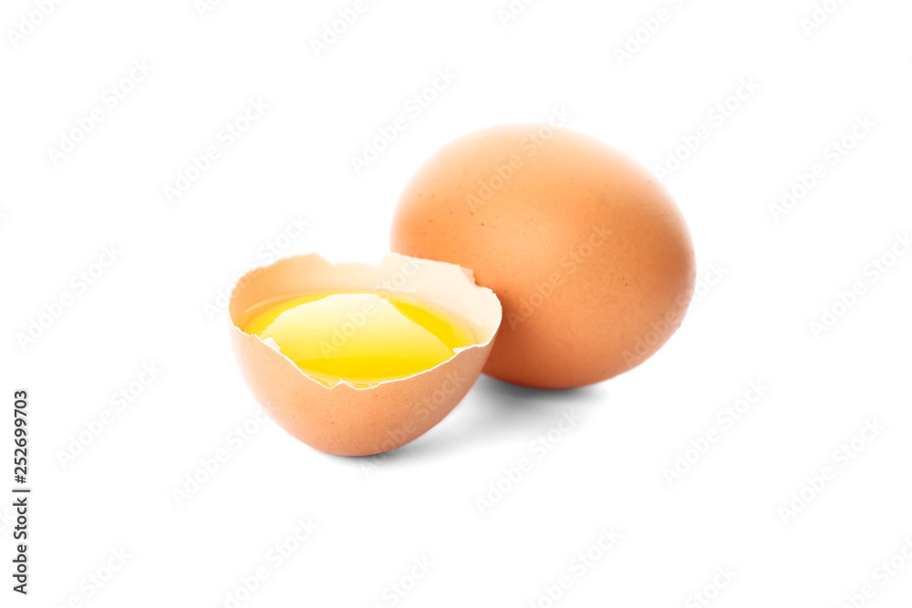 Chicken egg and half yolk isolated on white background Chicken egg and half yolk isolated on white background