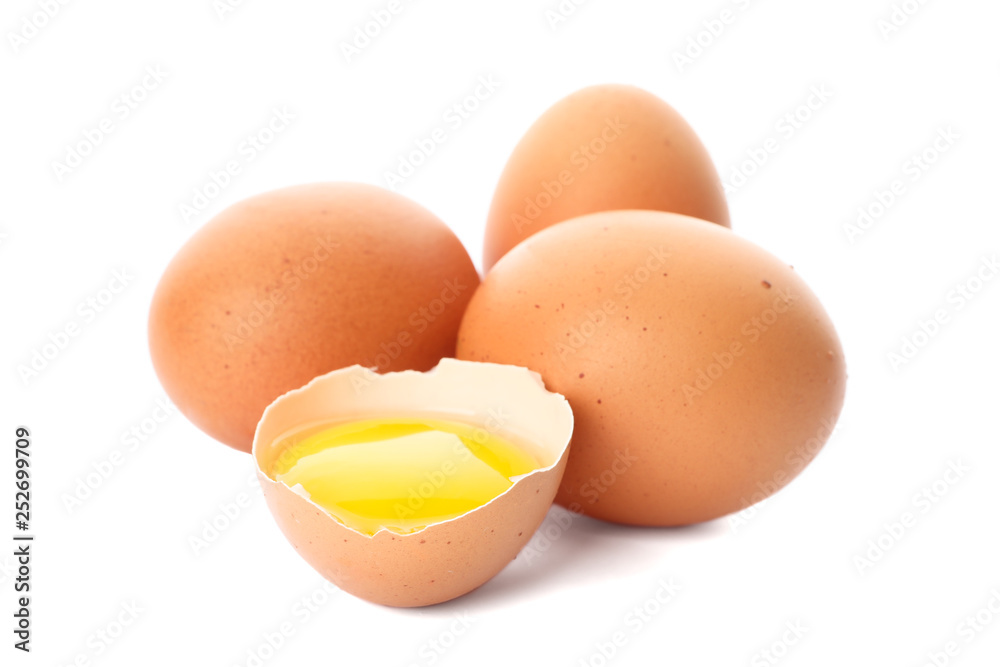 Chicken eggs and half yolk isolated on white background Chicken eggs and half yolk isolated on white background