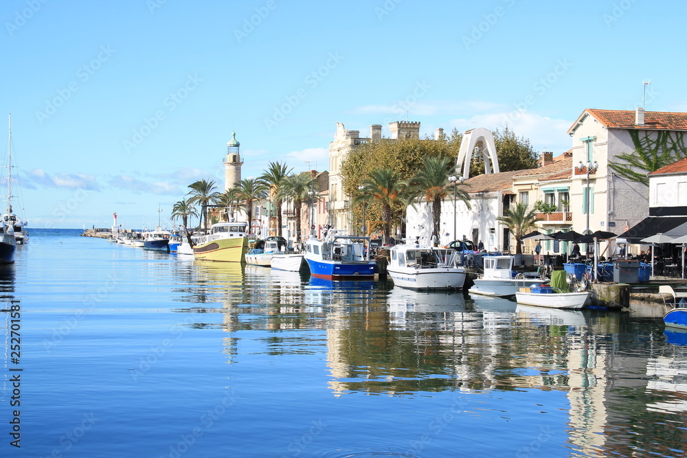 Lighthouse and old fishing port of Grau du roi in Camargue, a resort on the coast of Occitanie region in France