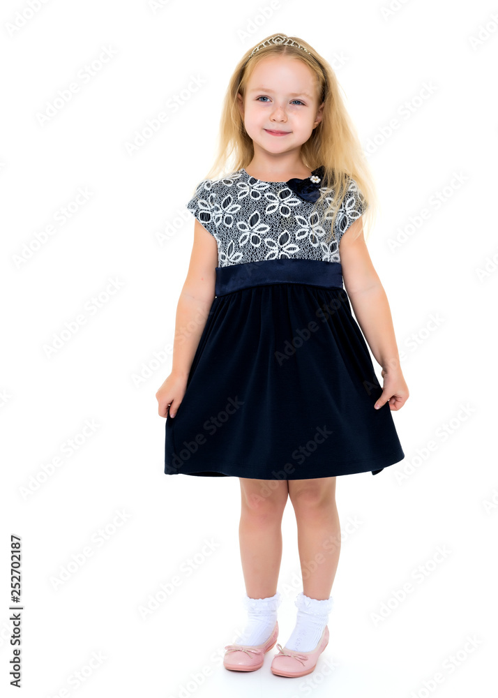 Little girl in an elegant dress. Little girl in an elegant dress.
