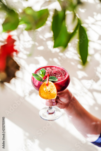 summer mocktail in the hand