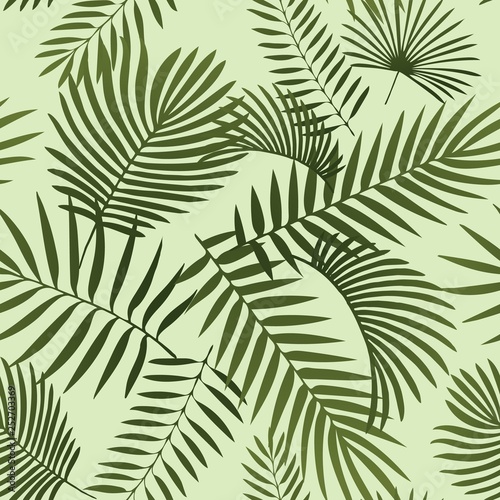 Green tropical leaves. Seamless graphic design with amazing palms leaves