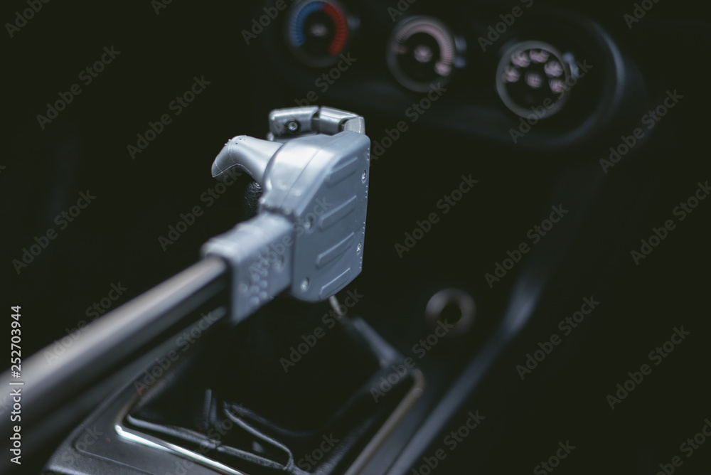 Robot hand on car gearstick. Robot pilot is driving a car. Automatic driver concept. Robot hand on car gearstick. Robot pilot is driving a car. Automatic driver concept.