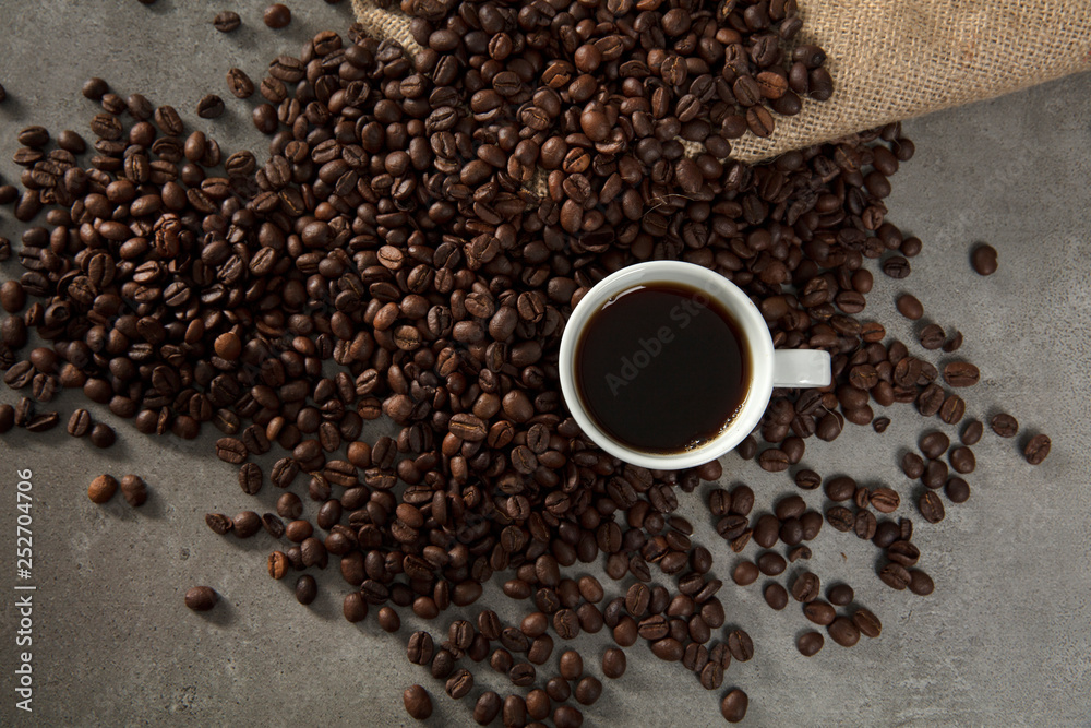 Coffee beans and cup