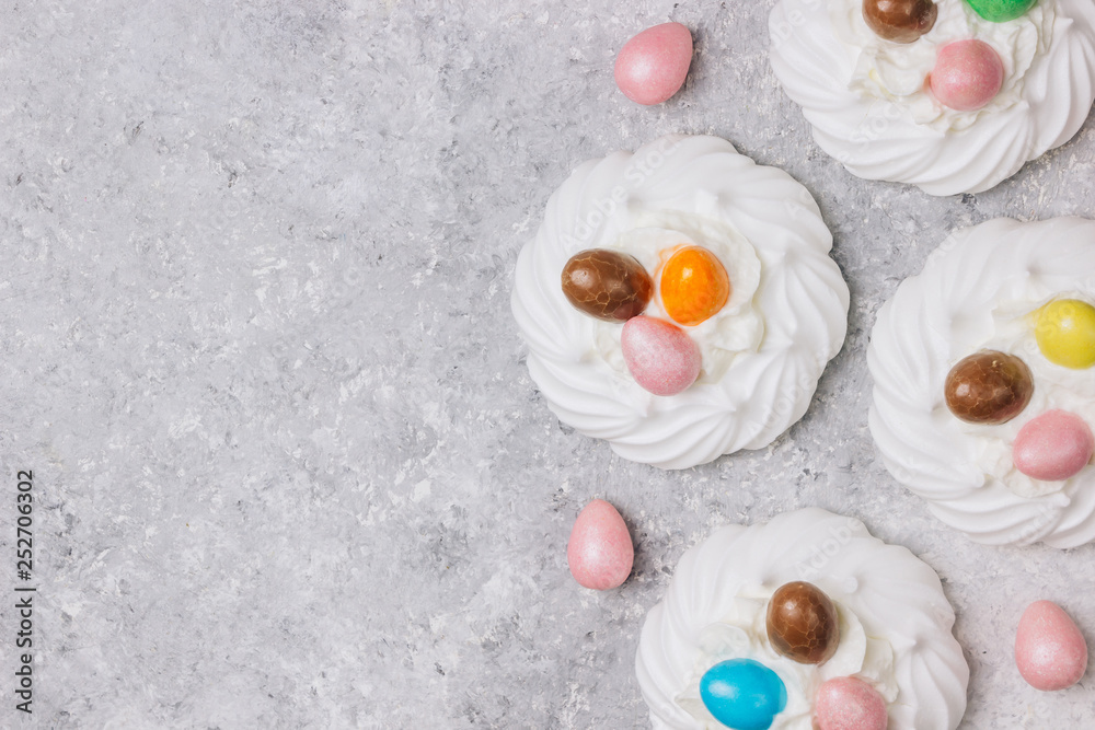 Close-up of pastel colored chocolate Easter egg candy with white meringue Close-up of pastel colored chocolate Easter egg candy with white meringue