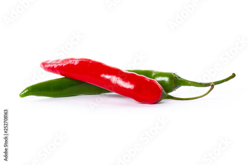 red and green chili peppers isolated on white background