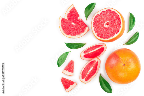 Fototapeta Naklejka Na Ścianę i Meble -  Grapefruit and slices with leaves isolated on white background with copy space for your text. Top view. Flat lay pattern