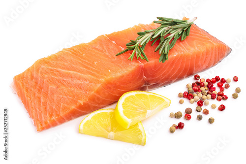 fillet of red fish salmon with lemon and rosemary isolated on white background
