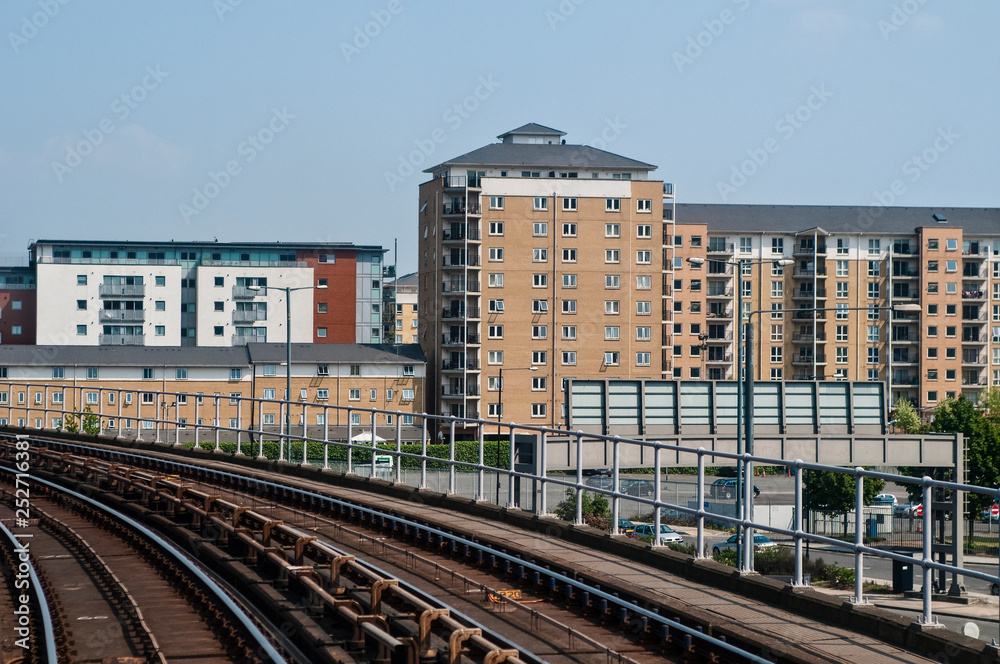 View of new housing developments from a driverless DLR train, London, UK