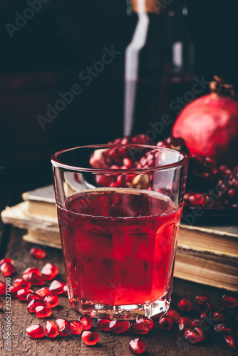 Drinking glass with pomegranate cocktail