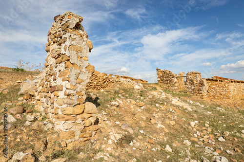 ruins of old houses in Villanueva del Rebollar de la Sierra, province of Teruel, Aragon, Spain photo