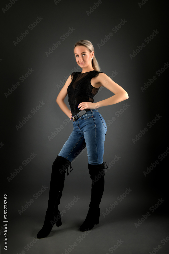 beautiful woman with long blond hair on black background beautiful woman with long blond hair on black background