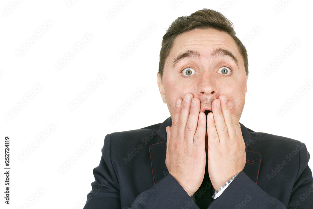 No way! Closeup portrait of a shocked man holding his face copyspace on the side No way! Closeup portrait of a shocked man holding his face copyspace on the side