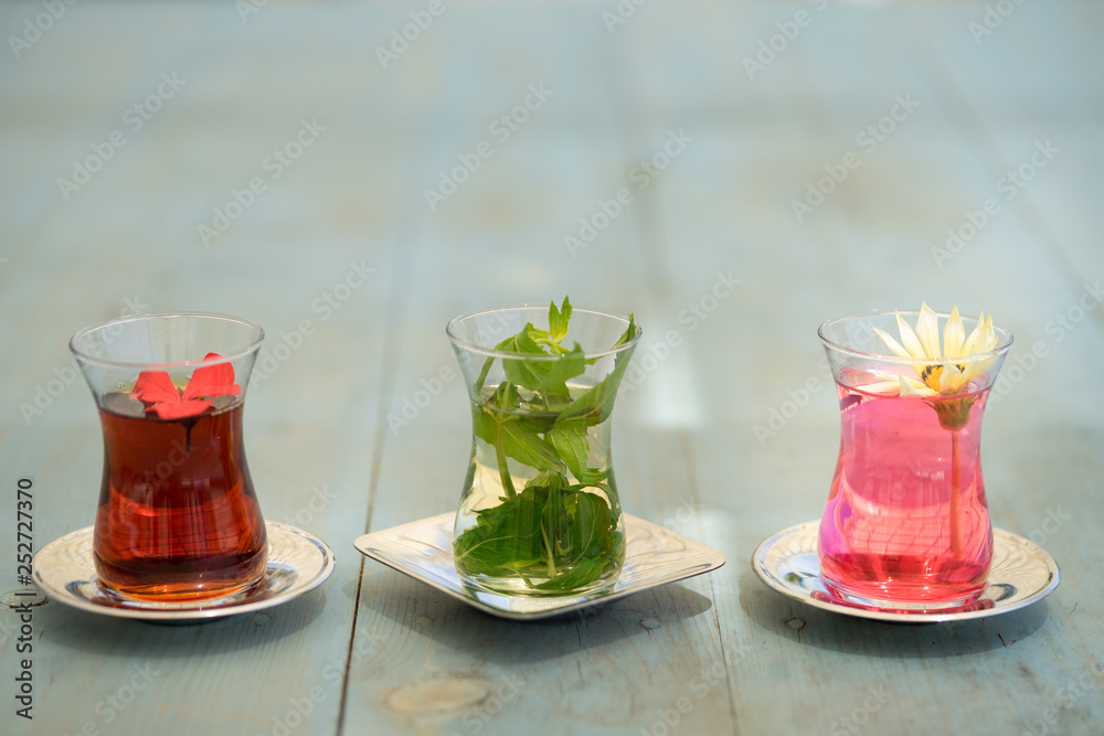 traditional Turkish red black tea tulip glass green flowers sweet dessert afternoon tea break