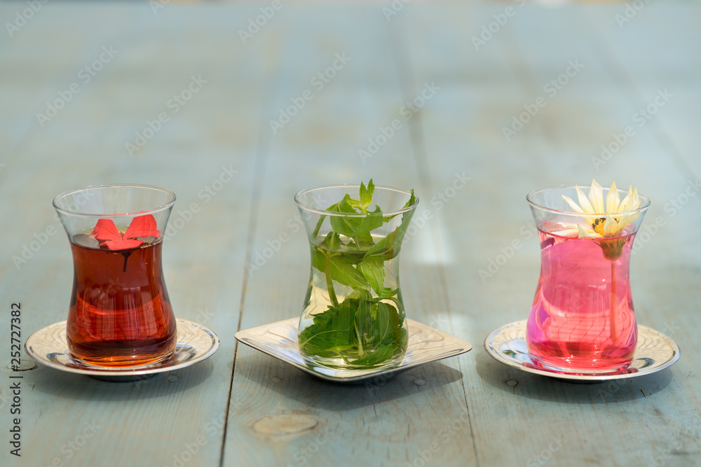 traditional Turkish red black tea tulip glass green flowers sweet dessert afternoon tea break