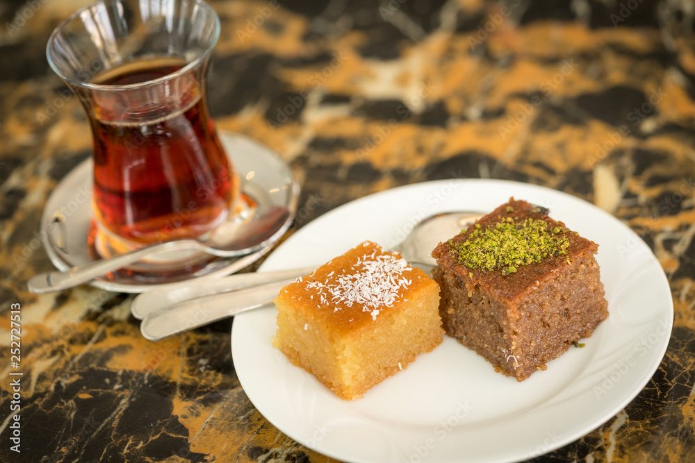 traditional Turkish red black tea tulip glass green flowers sweet dessert afternoon tea break