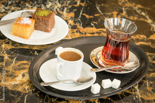 traditional Turkish red black tea tulip glass green flowers sweet dessert afternoon tea break