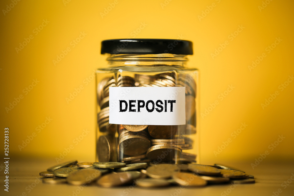 Deposit Concept Glass Jar With Coins Inside Deposit Concept Glass Jar With Coins Inside