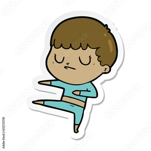 sticker of a cartoon grumpy boy