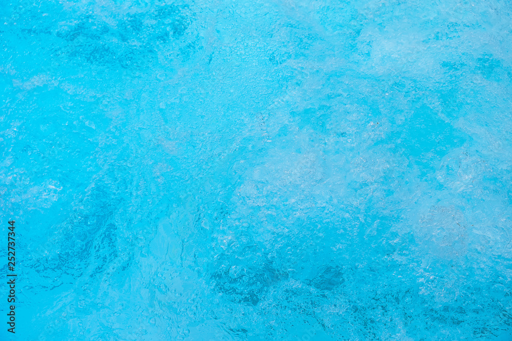 A natural texture .Turquose water in the pool of an Italian resort