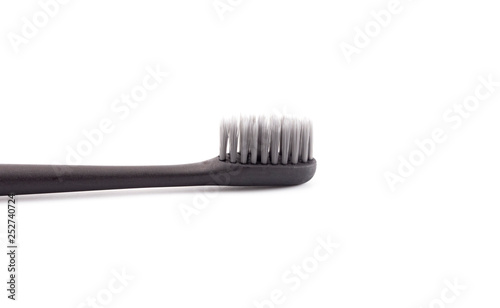 Black Toothbrush without Toothpaste on a White Background