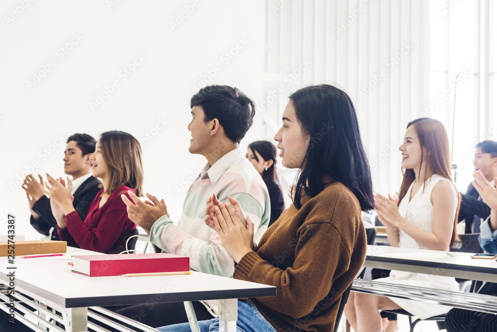 Successful of group student clapping hands in classroom Successful of group student clapping hands in classroom