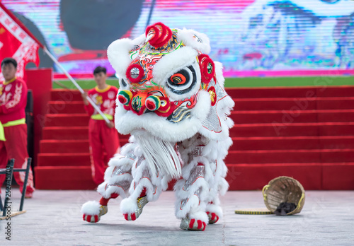 Ho Chi Minh City, Vietnam - December 30th, 2018: Lion dancing competition performing arts welcome new year by Tourism Department of city held 2nd attract visitors to cheer in Ho Chi Minh city, Vietnam © huythoai