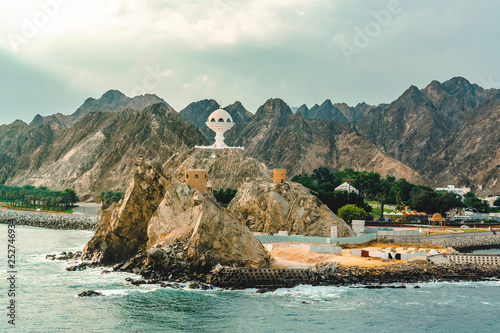 Muscat, Oman - December 16, 2018: view of the Riyam Park Monument from the sea photo