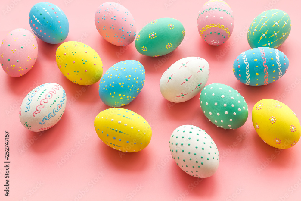 Colorful Easter eggs background on pink background