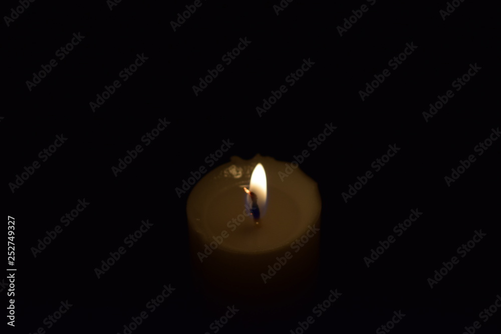 Candle Light flame close up With black background Candle Light flame close up With black background