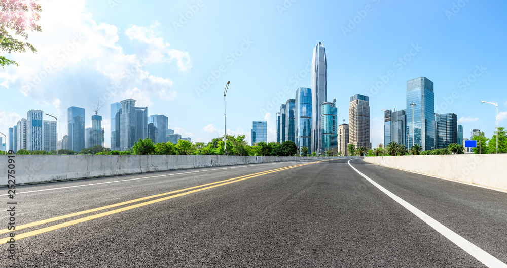 Asphalt highway with panoramic city skyline in Shenzhen