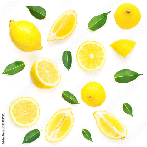 Lemon slices with leaf isolated on white background. Tropical abstract creative Summer background. Flat lay, top view.