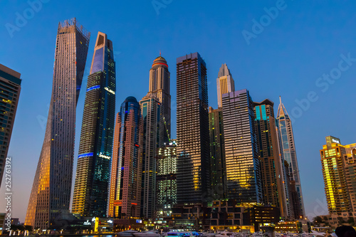 Dubai, UAE - November 29, 2018: High-rise houses of modern futuristic design of Dubai Marina district. © sv_production
