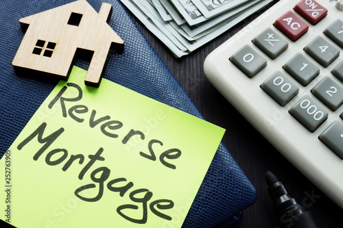 Canvas Print Reverse mortgage written on a memo stick.