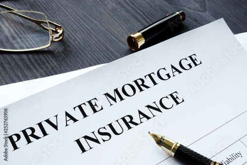 Private Mortgage Insurance PMI form with pen. photo
