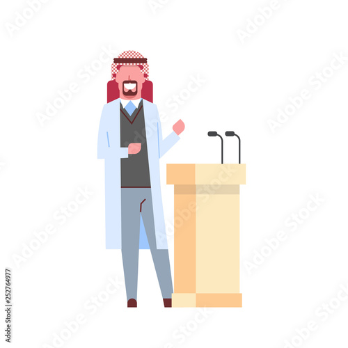 arab male doctor giving speech from tribune with microphones arabic man in keffiyeh hospital medicine worker cartoon character full length white background flat