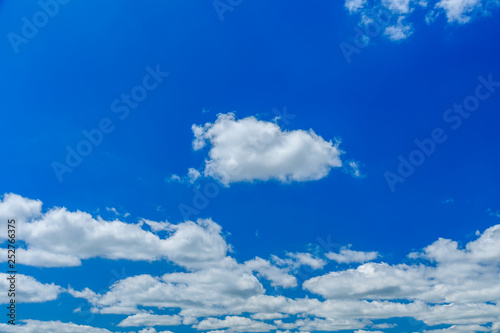 White fluffy clouds in a blue sky © ihorbondarenko