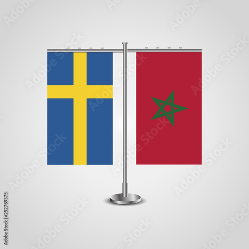 Table stand with flags of Sweden and Morocco.Two flag. Flag pole. Symbolizing the cooperation between the two countries. Table flags